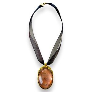 Handmade ribbon choker with handcrafted pendant design